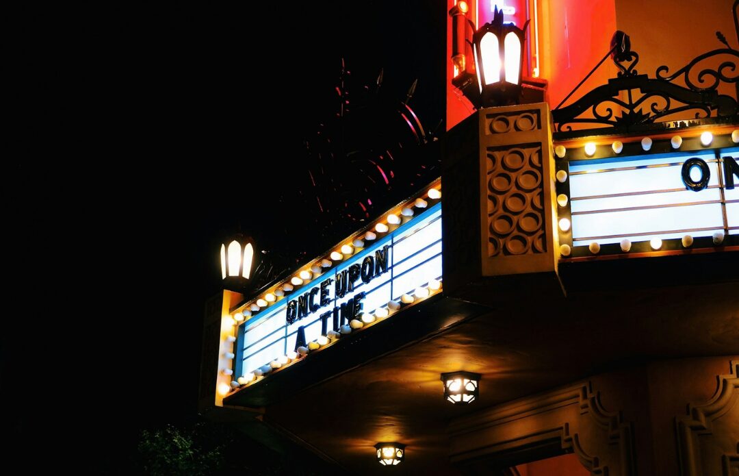 A theater marquee lit up at night