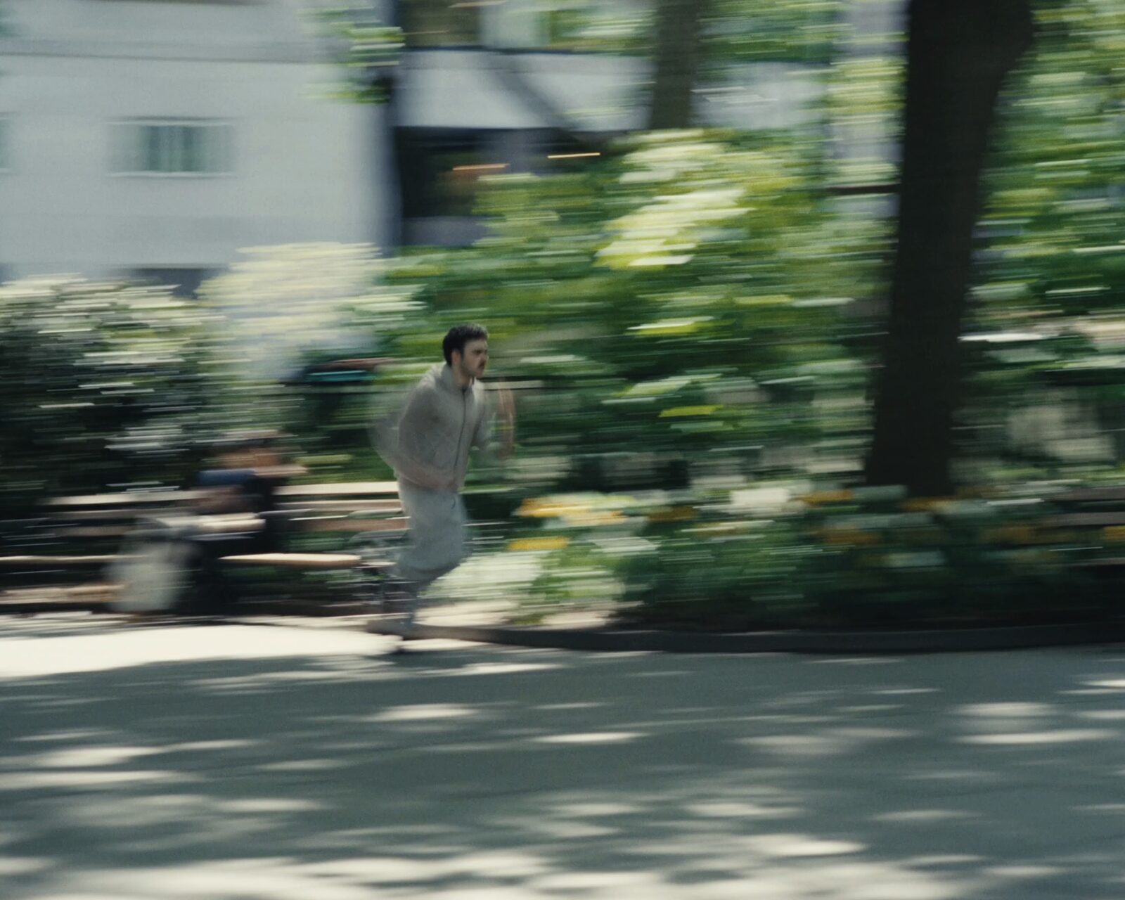Leo Gabriel running in a scene from Running Through the Void